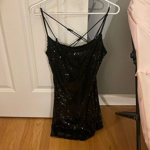 Black sparkly spaghetti strap mini dress.